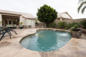 Sealed concrete around pool in Arizona